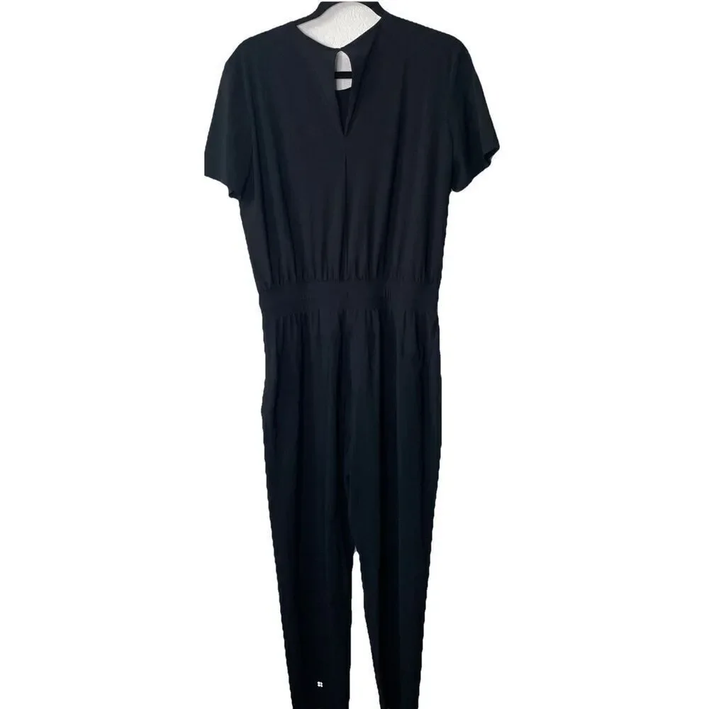NWT's Sweaty Betty L71809 Womens Black Explorer Short Sleeve Jumpsuit 29” Sz L U